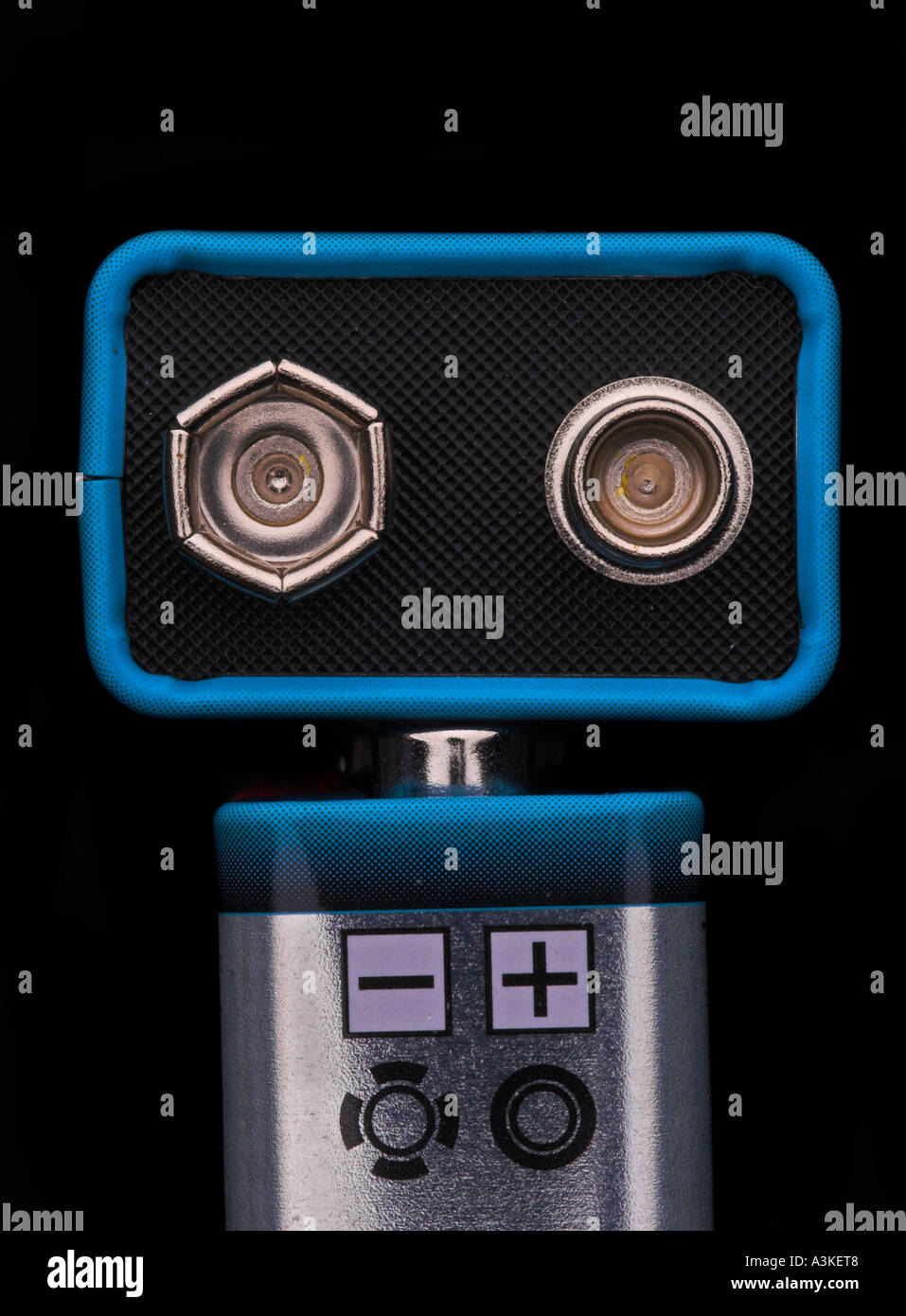 Battery, plus- and minus-pole, studio-shot, isolated on black Stock Photo