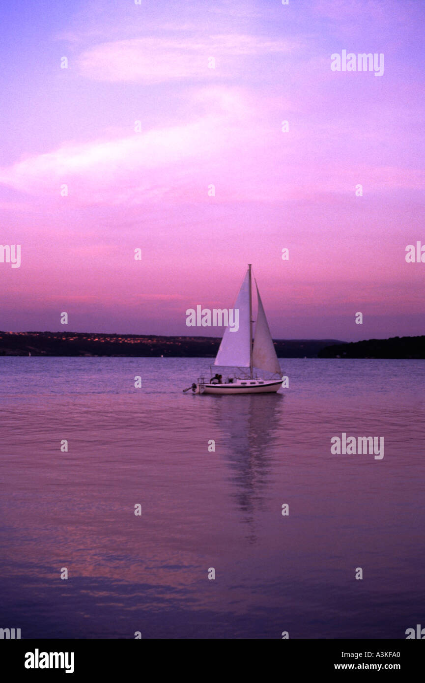 Sailboat at sunset on Lake Cayuga New York USA Stock Photo