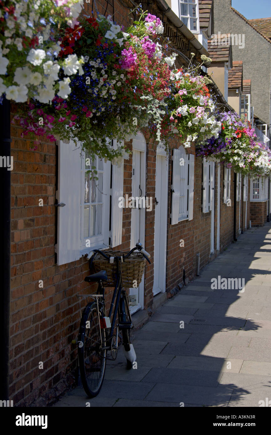Hanging Baskets and bicycle Stratford Upon Avon Warwickshire Stock