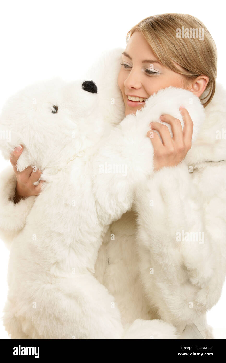 Young woman cuddling teddy bear Stock Photo Alamy
