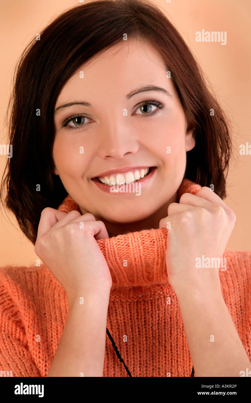 Young woman wearing sweater Stock Photo