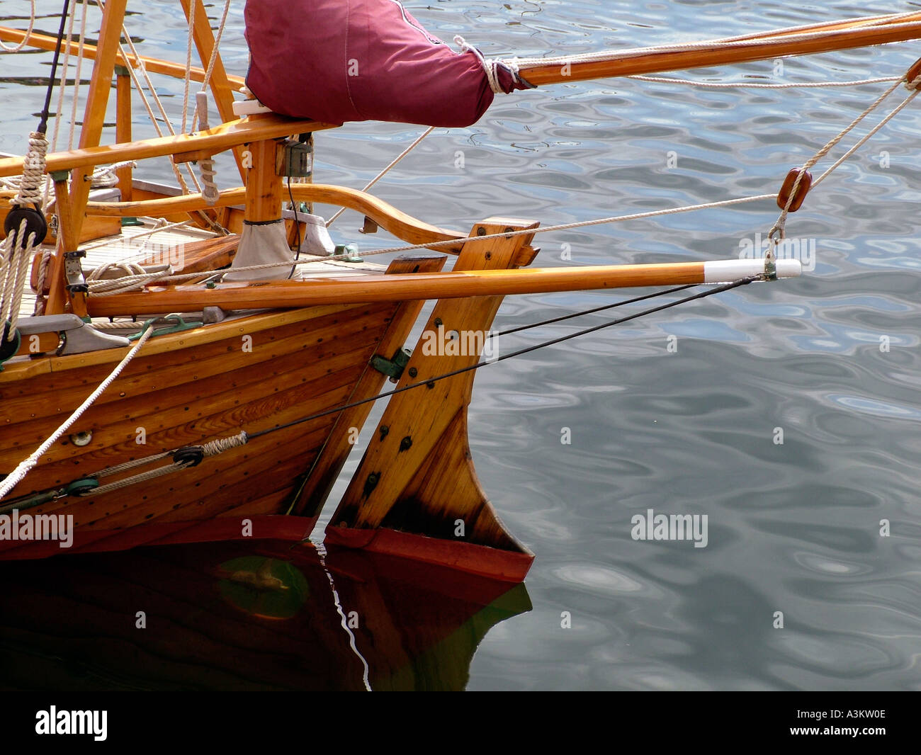 Wooden boat on water Australia Stock Photo - Alamy