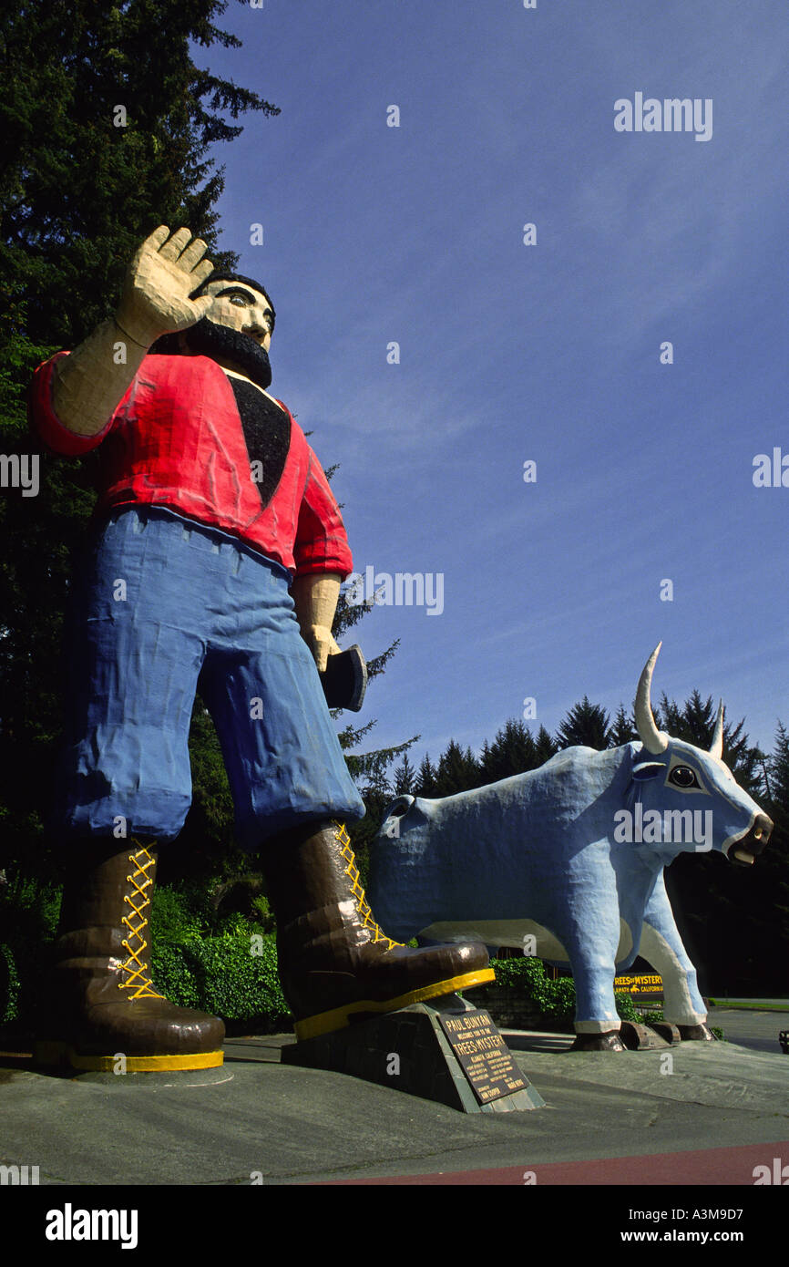 Larger than life size wooden carved statue of American folk legend Paul Bunyan and Babe the Blue Ox near the Trees of Mystery Stock Photo