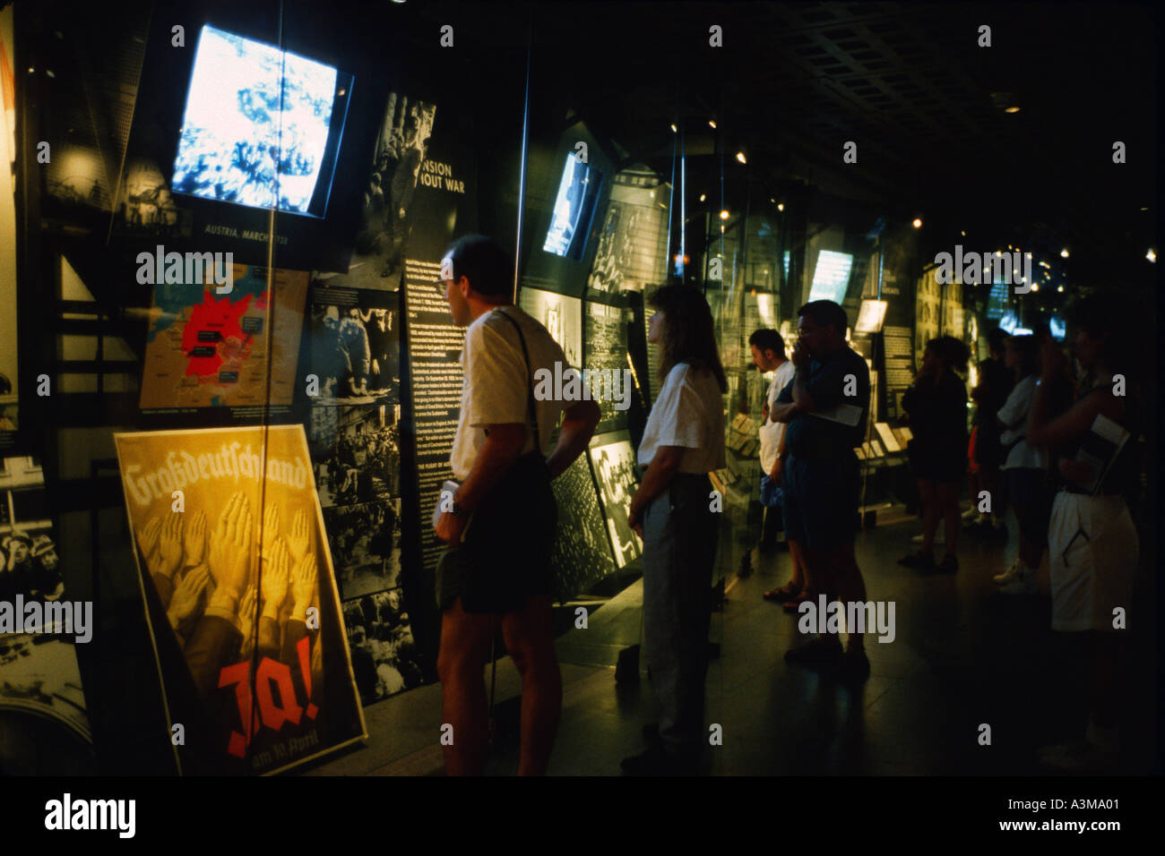 People viewing display inside the United States Holocaust Memorial Museum Washington DC USA Stock Photo