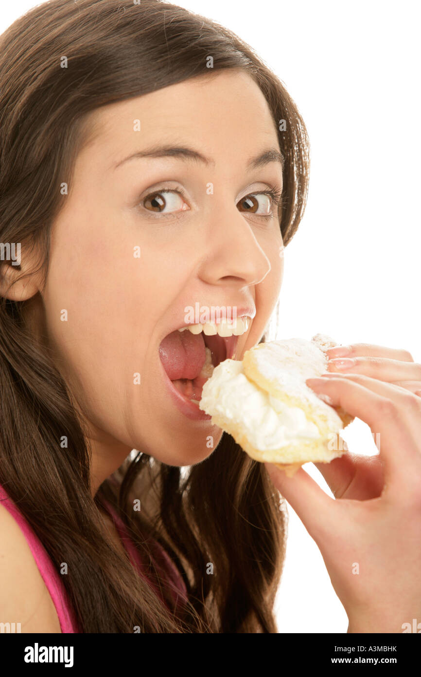 Woman eating cake Stock Photo