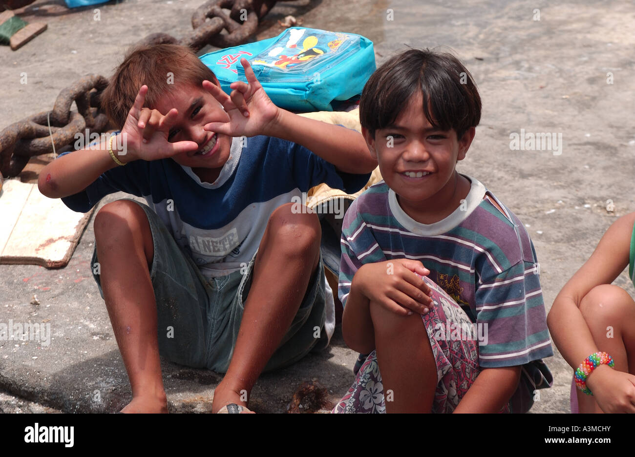 local kid in Polonesia in Mangaravia Island Stock Photo