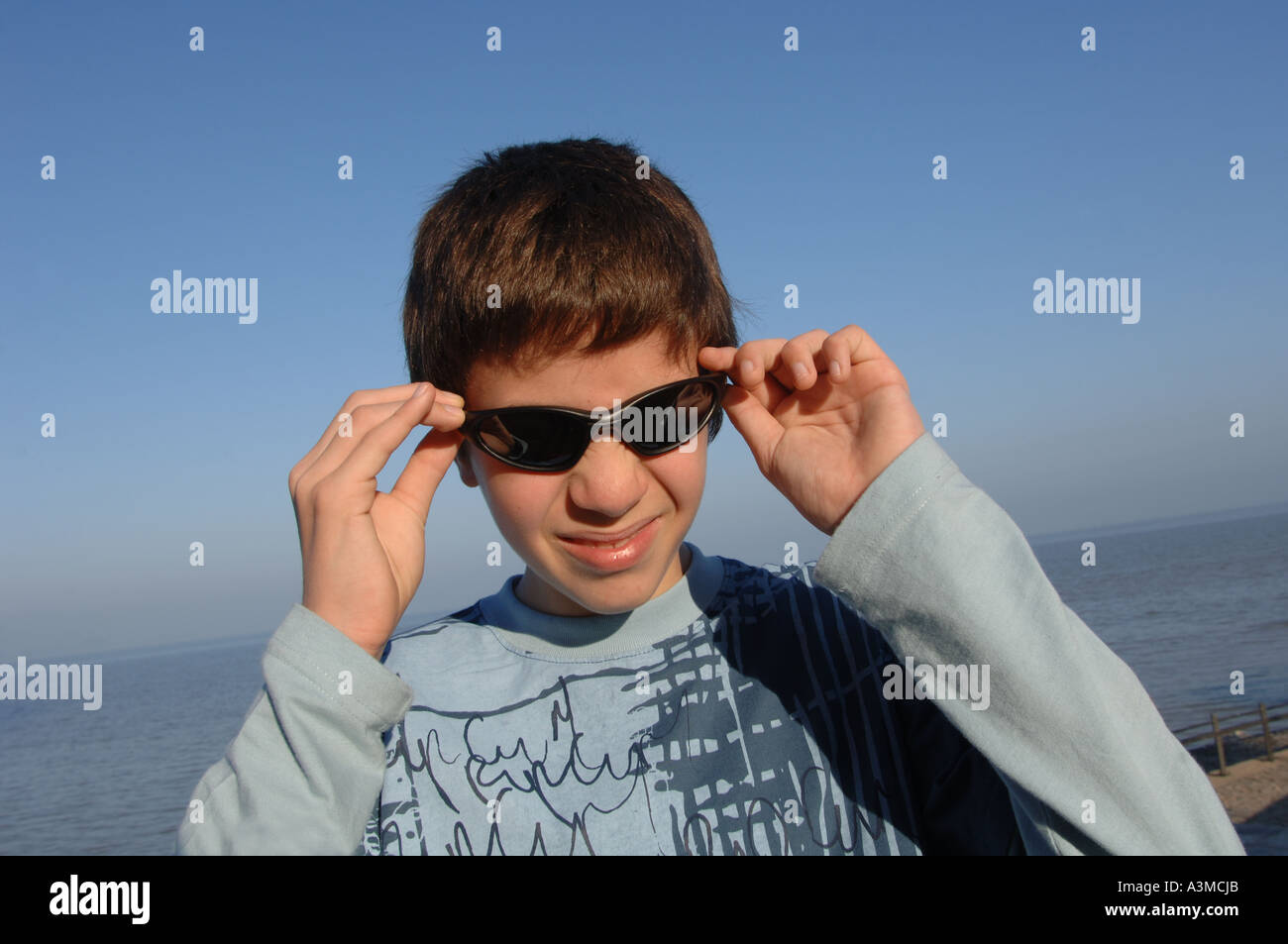 teenager boy with sunglasses Stock Photo Alamy