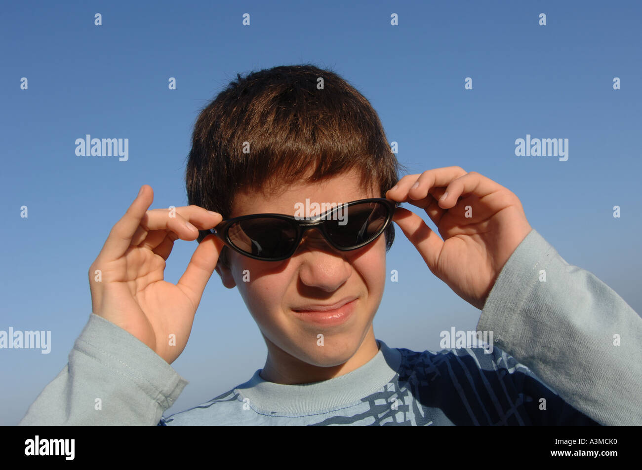 teenager boy with sunglasses Stock Photo Alamy