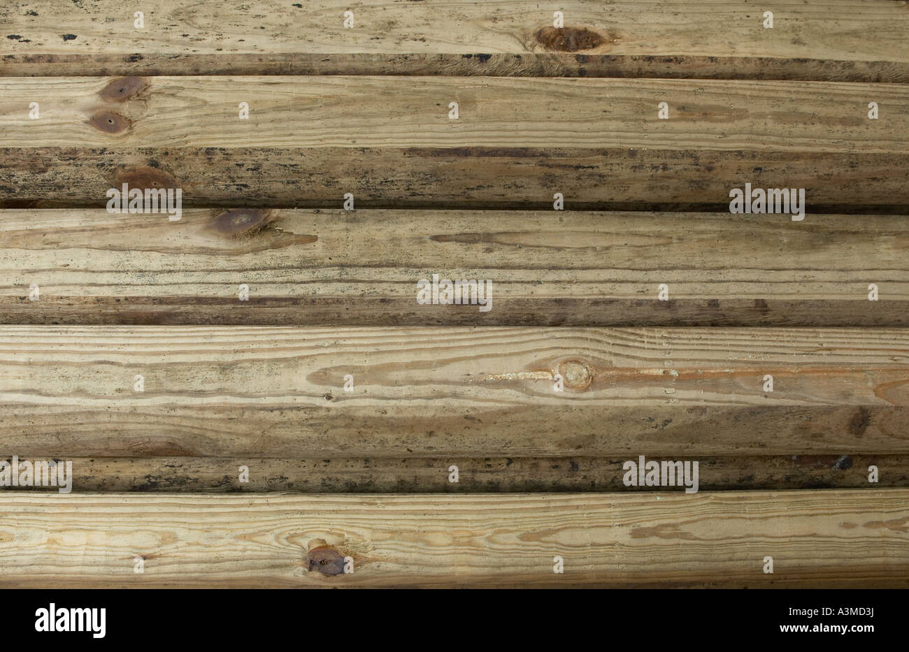 close up detail lumber yard wood wooden posts texture knots Stock Photo Alamy