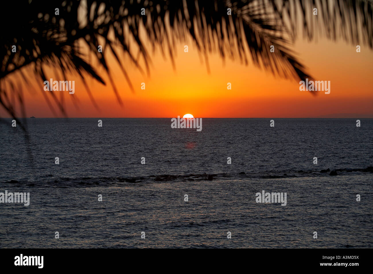 An Horizon Sunset With A Bright Orange Skyline Looking Across The Ocean 