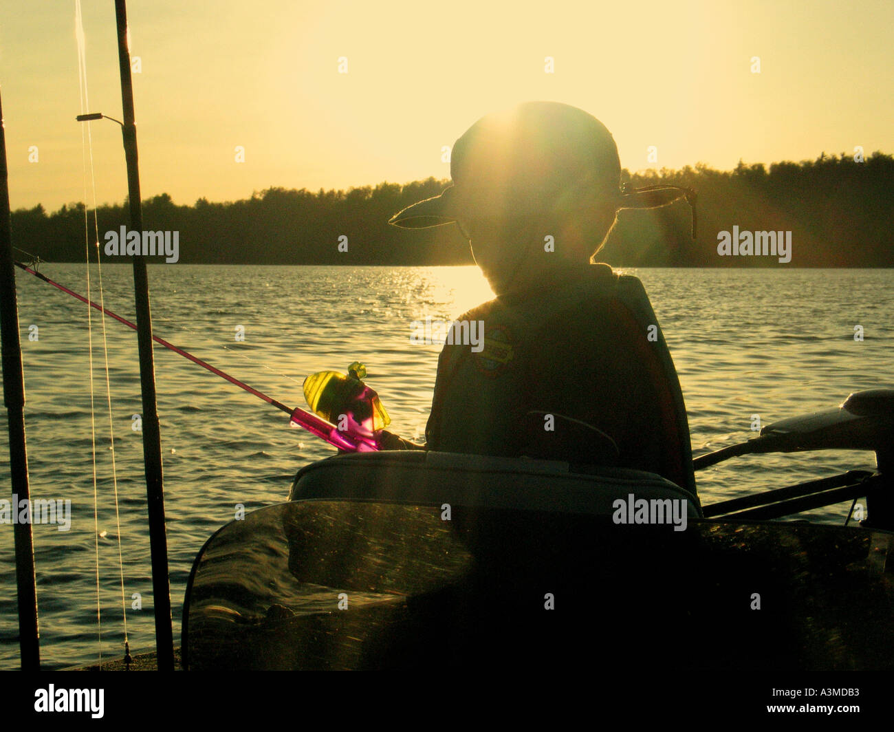 Boy boat wearing life jacket hi-res stock photography and images - Alamy