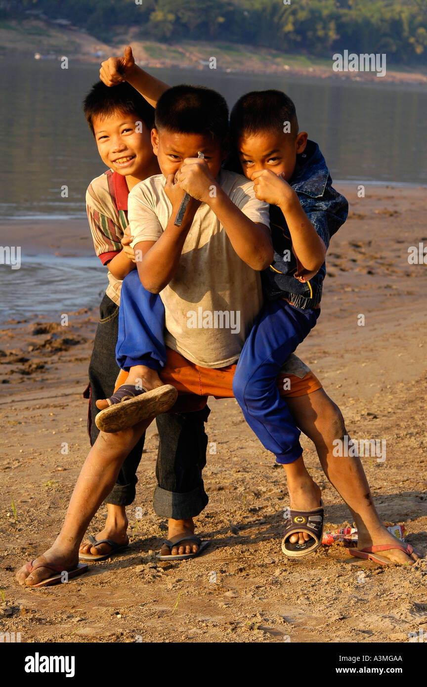 Group of Lao Boys on the Sandy Shore of Mekong River in Louangphrabang ...