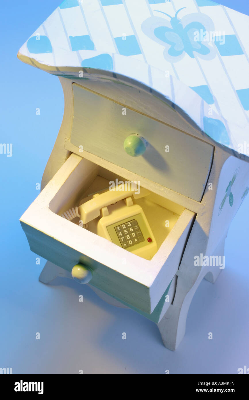 Miniature Phone in Toy Drawer Stock Photo Alamy