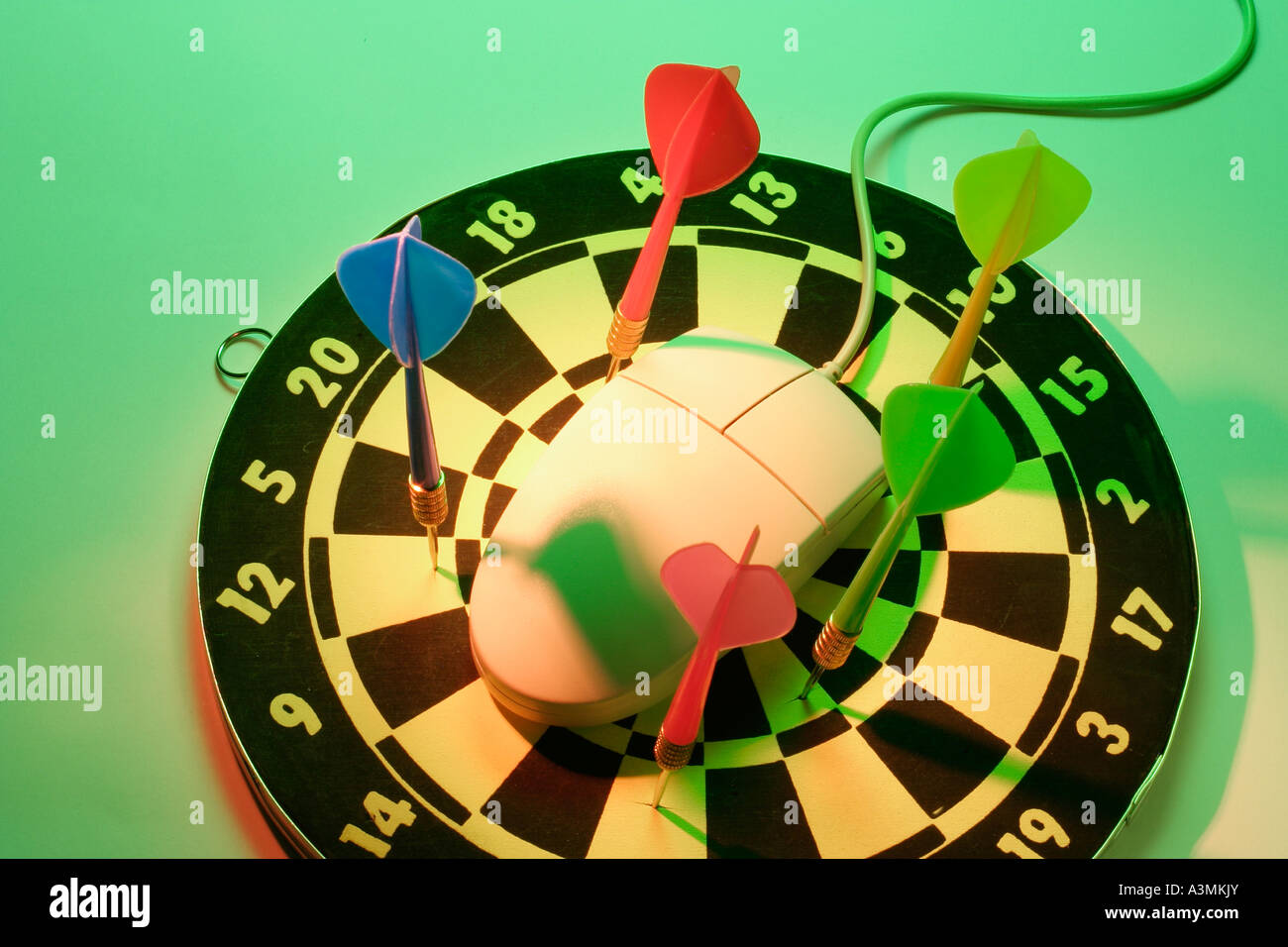Computer Mouse and Darts on Dartboard Stock Photo Alamy