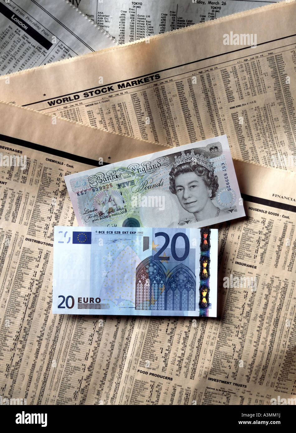 Euro And 5 British Pounds Banknotes On Financial Papers Stock Photo Alamy