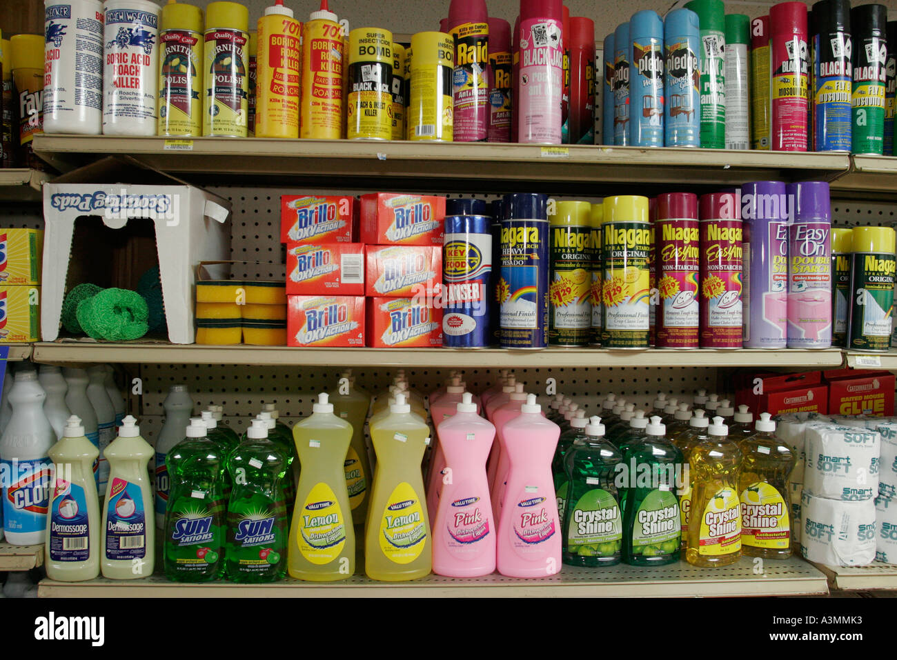 Florida FL South Miami Overtown L & J Groceries shelf shelves shelving products display sale product cleaning products soap pesticides bug Stock Photo