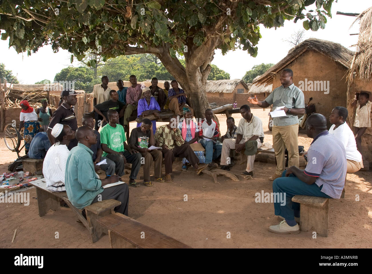 Villagers in Northern Ghana meeting to discuss conservation and environmental concerns within the village community. Stock Photo