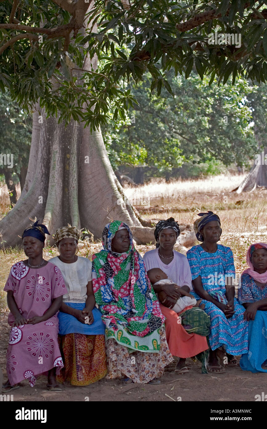Local women in Northern Ghana attending village meeting on alternative livelihood projects Stock Photo