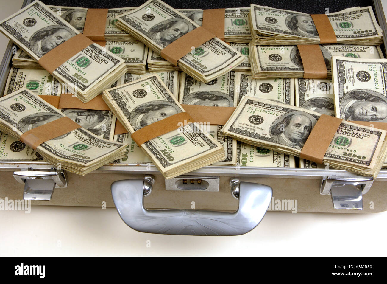 brief case full of 100 bills US Stock Photo