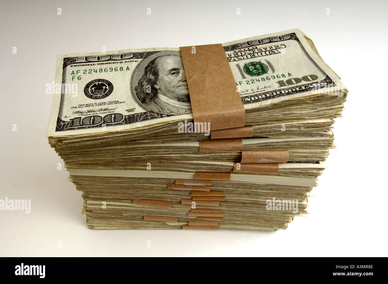 stack of US dollar bills Stock Photo