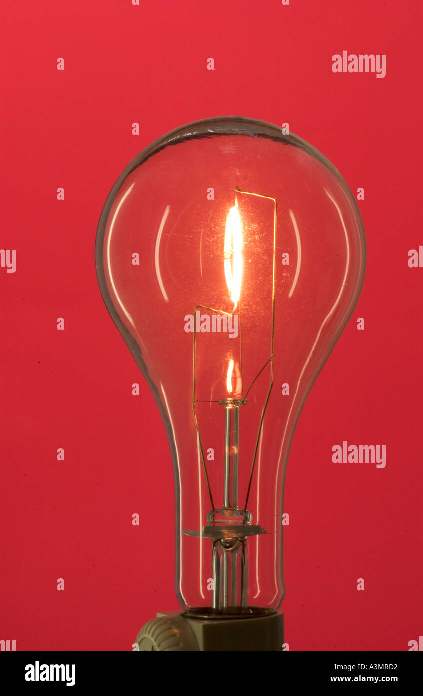 lighted tungsten light bulb Stock Photo Alamy
