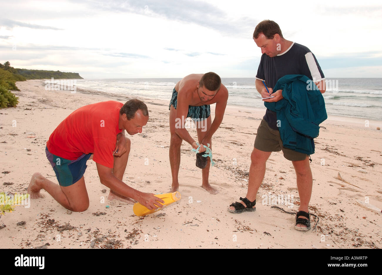 collecting litter on Henderson Island Stock Photo