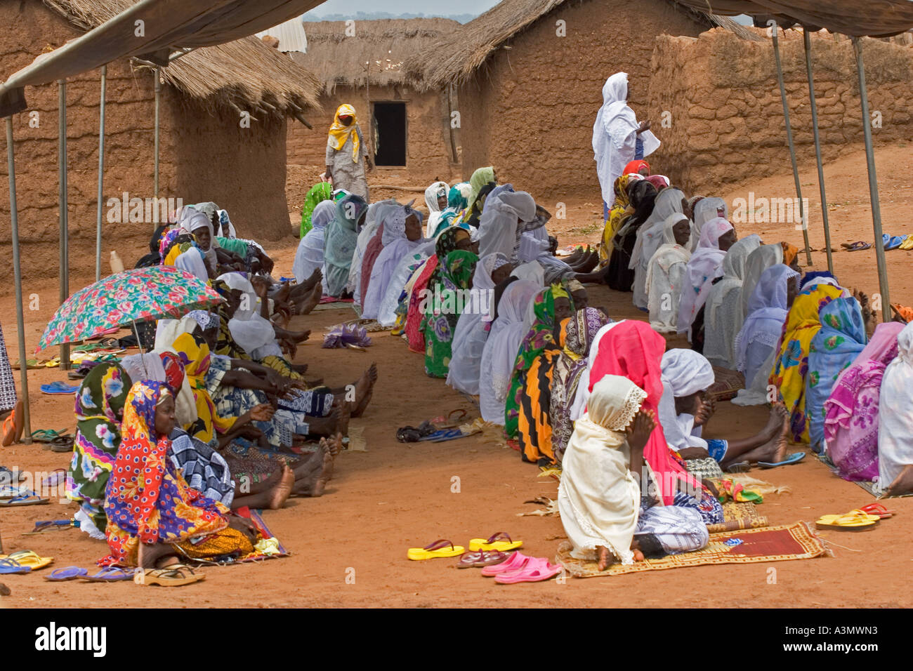 Women worshippers praying at Larabanga Mosque, Ghana Stock Photo