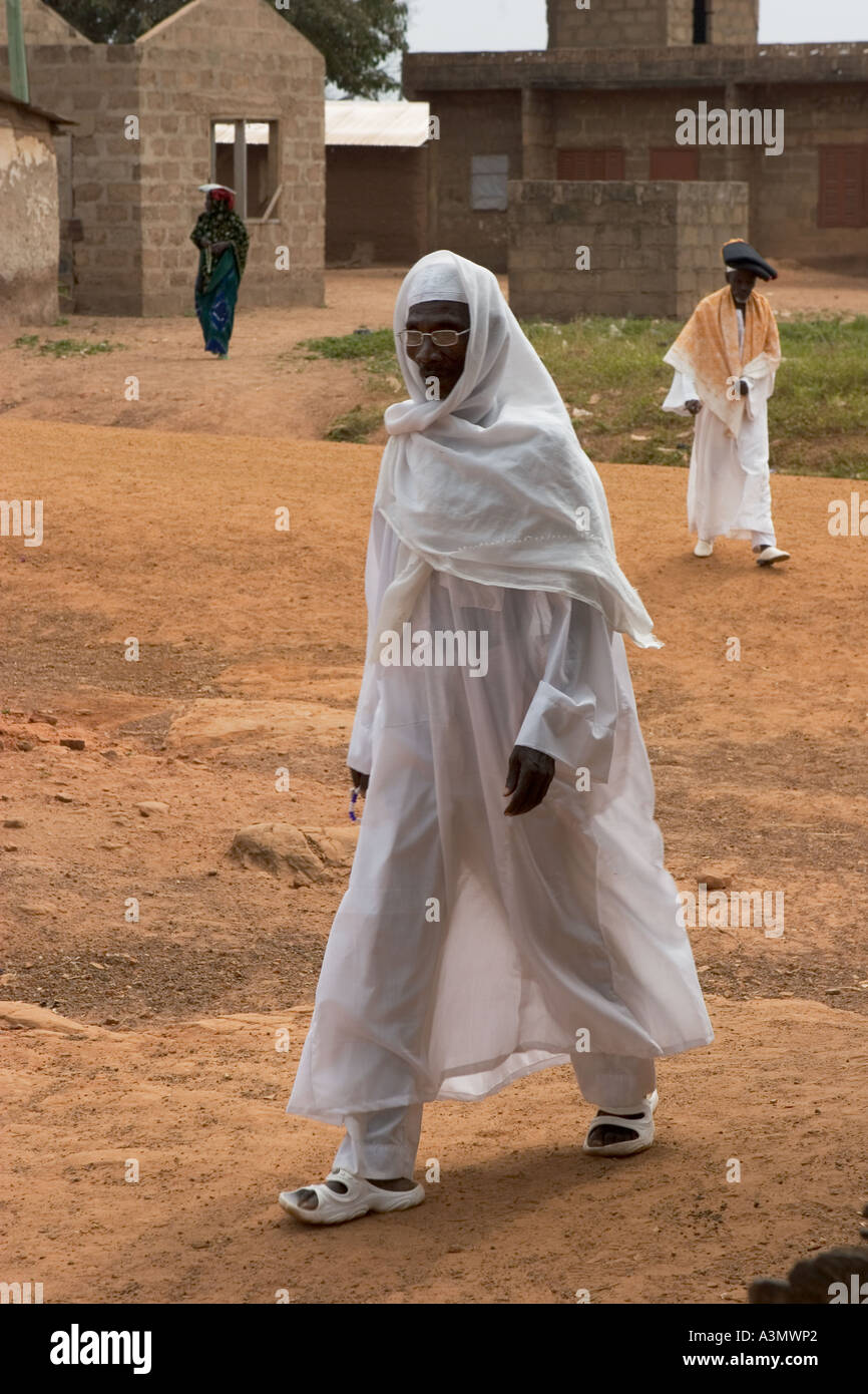 Villager going to Friday Prayers at Larabanga Mosque, Larabanga, Northern Ghana, West Africa. Stock Photo
