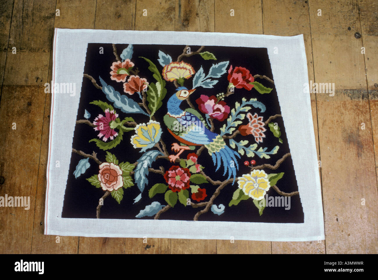 early american handmade needlepoint cover for slip seat chair Stock Photo Alamy