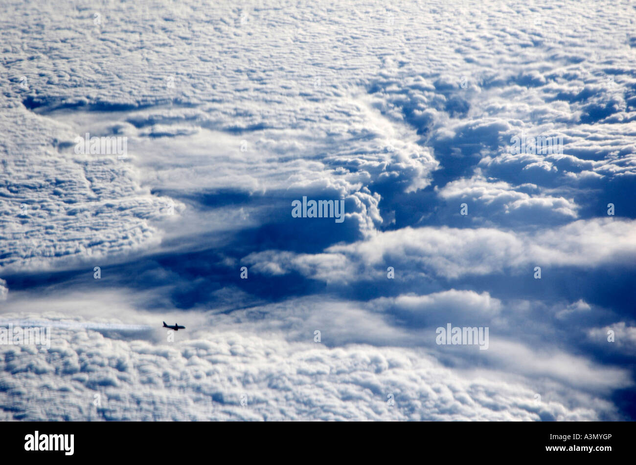 A plane flying above cloud Stock Photo - Alamy