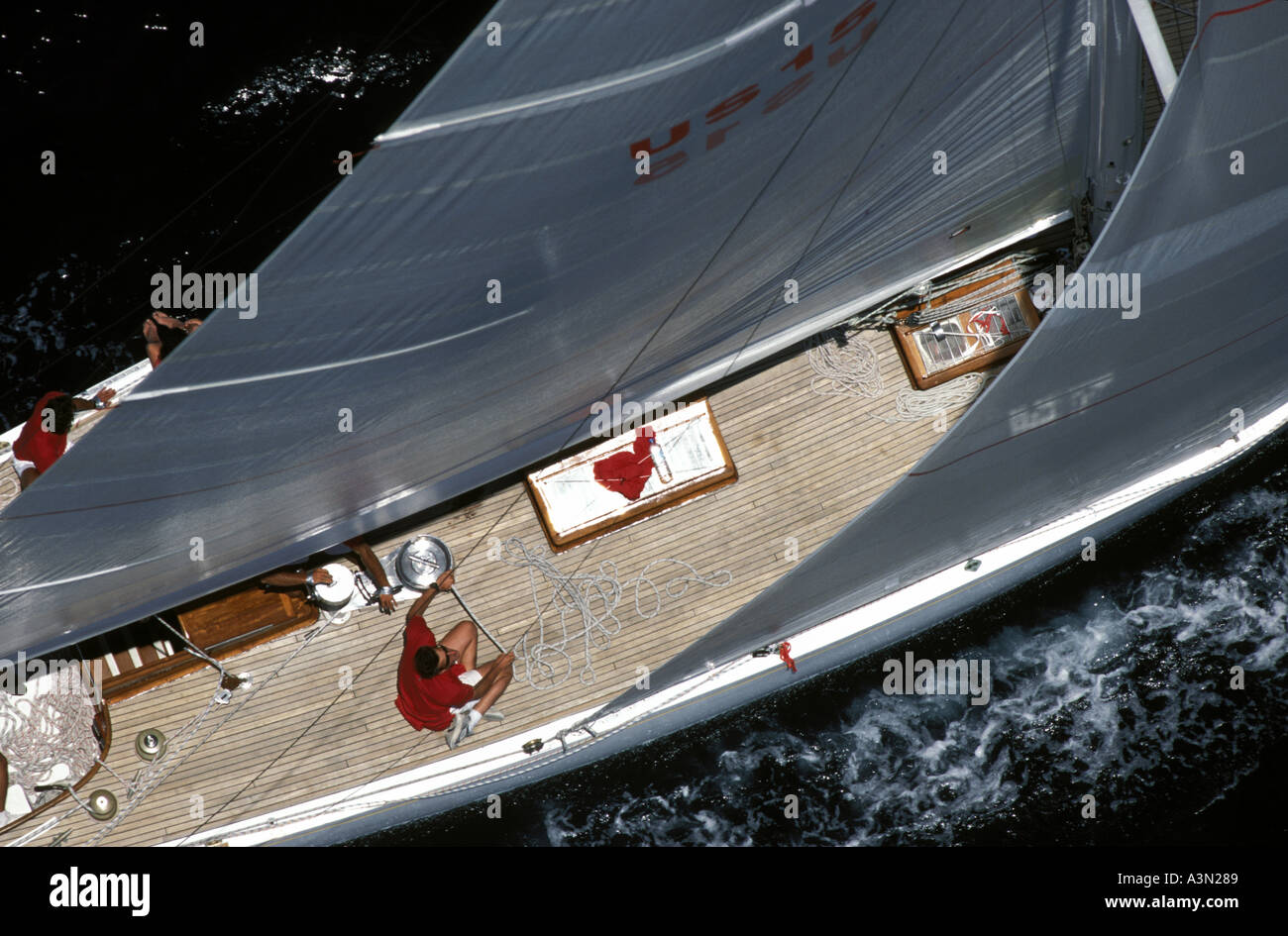 Aerial of genoa trimmer on a classic 12m in St Tropez Stock Photo