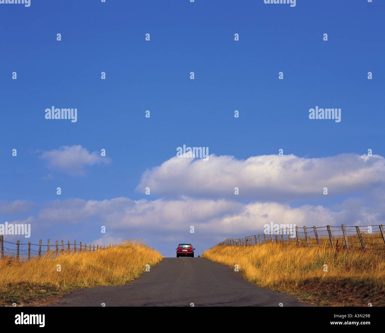 Road Transportation Cars Sky Clouds Fields Stock Photo