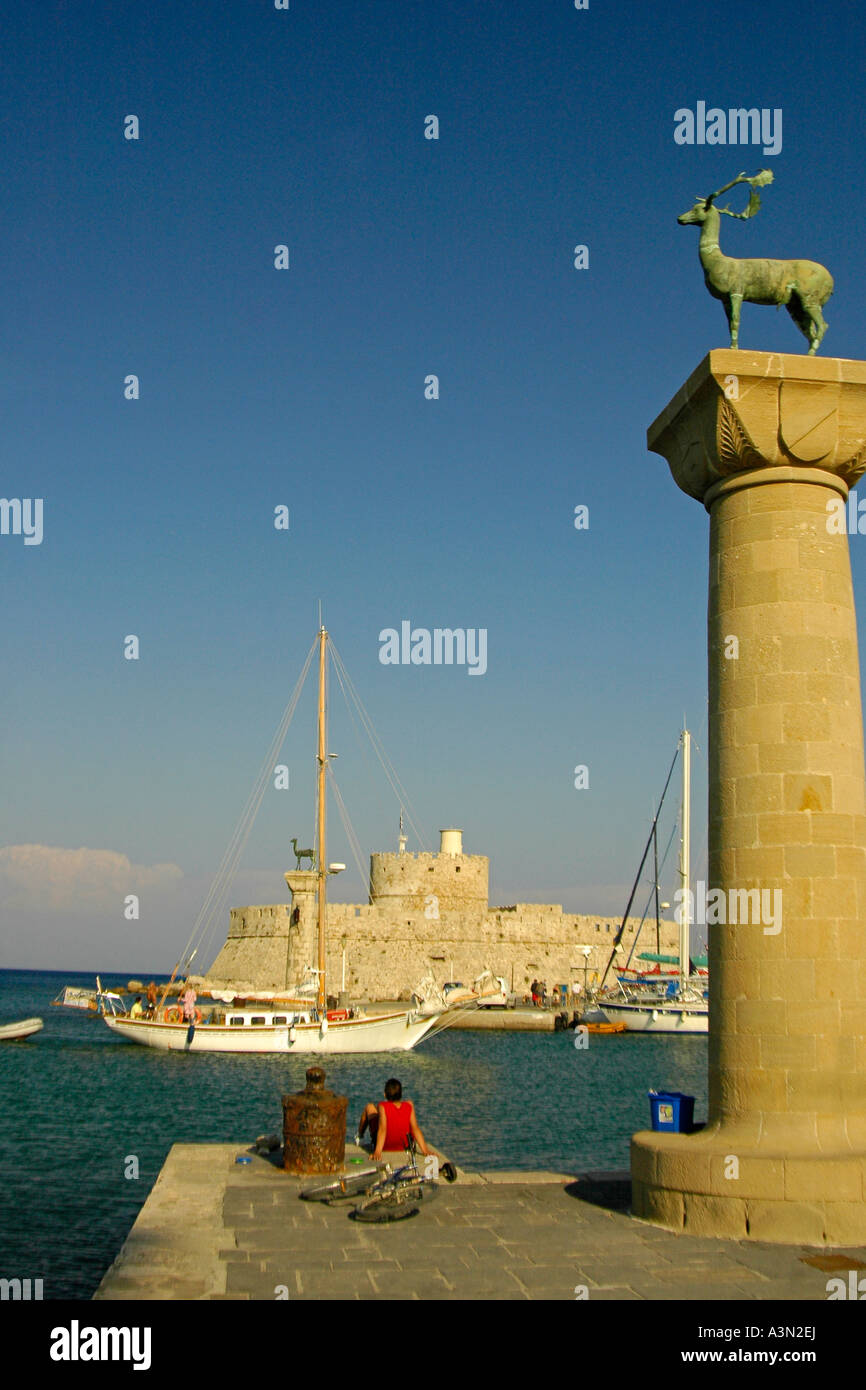 Mandraki Harbor entrance, Rhodes, Greece Stock Photo - Alamy