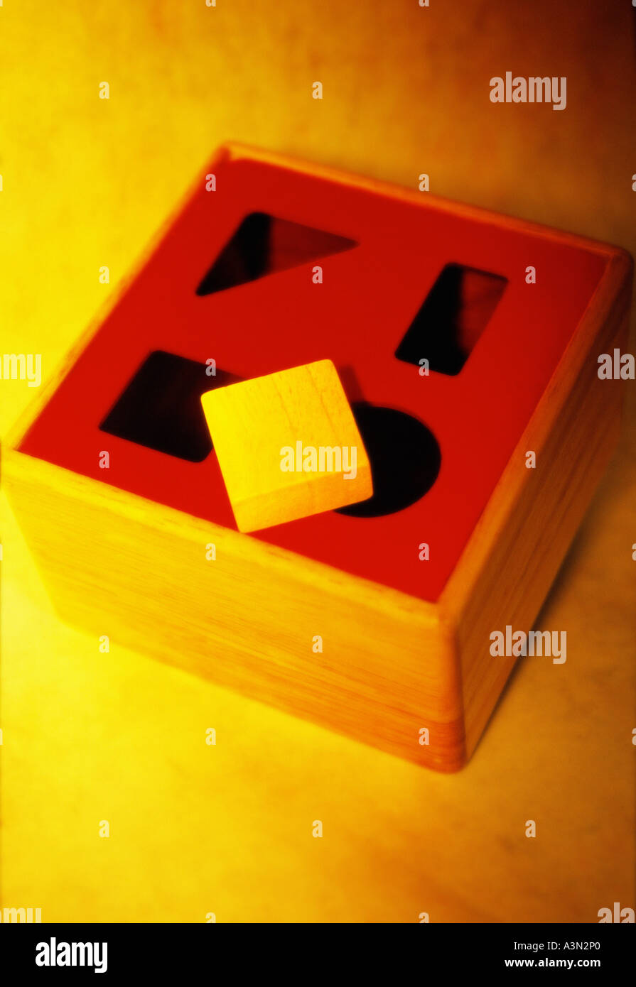 Square Peg In A Round Hole Stock Photo