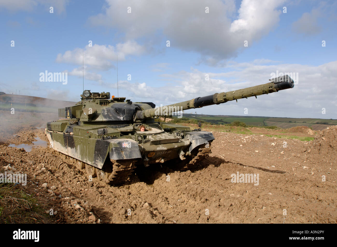 chieftan tank in action in muddy field in Bude . Cornwall Stock Photo Alamy