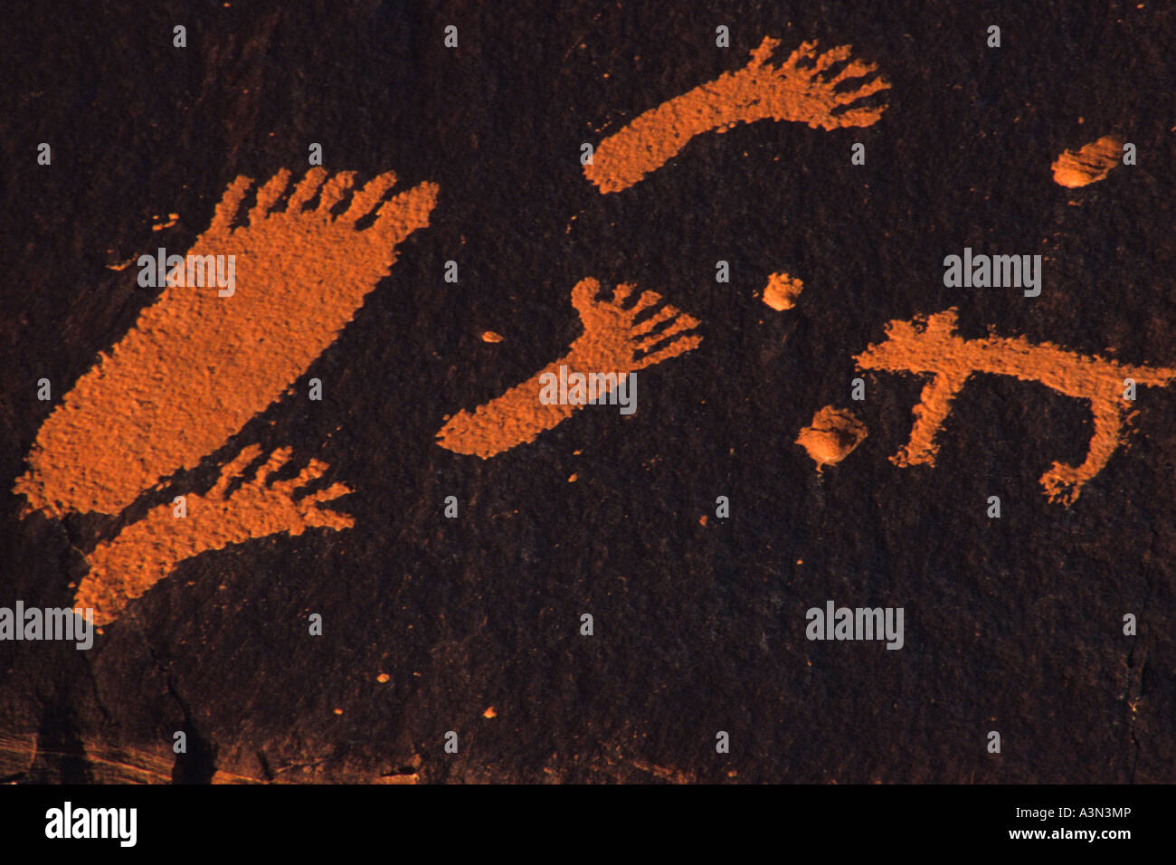 Petroglyphs and bullet pock marks, Newspaper Rock, Utah Stock Photo