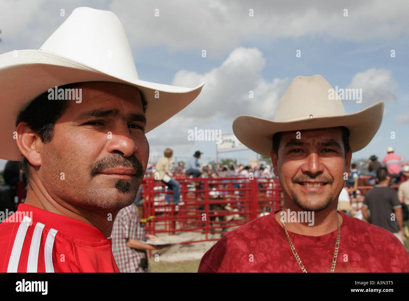 Miami Florida Homestead Championship Rodeo cowboy hats Hispanic Latin Latino ethnic immigrant immigrants minority men visitors travel traveling tour t Stock Photo Alamy