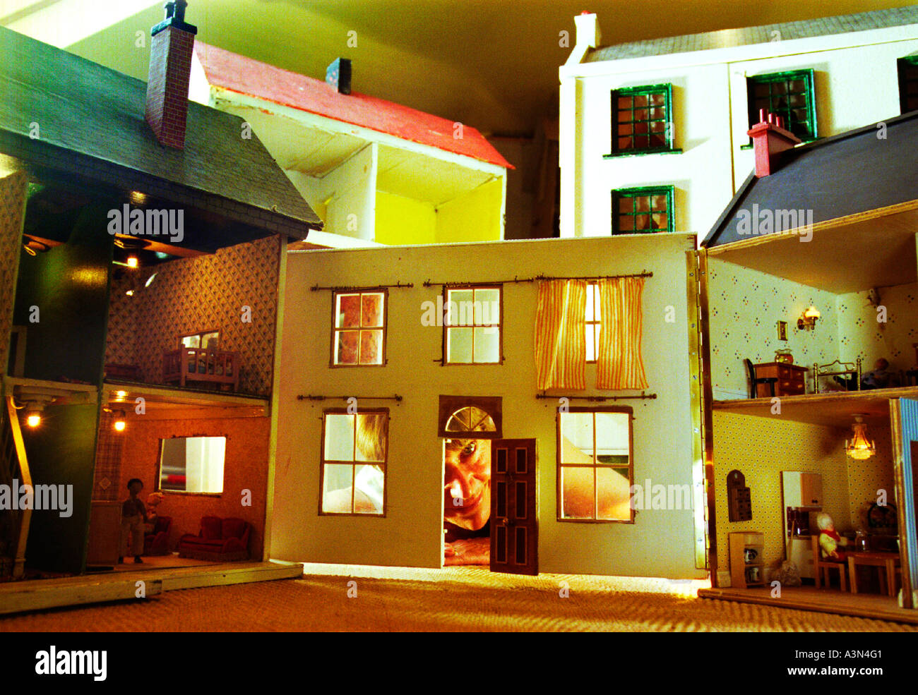 A spooky cluster of dolls houses in the attic of an old house in Hampshire Stock Photo Alamy