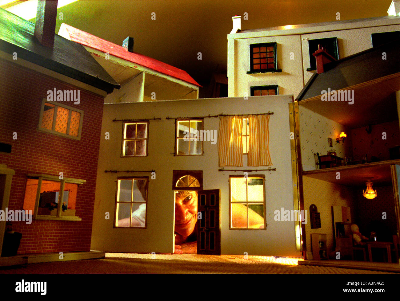 A spooky cluster of dolls houses in the attic of an old house in Hampshire Stock Photo Alamy