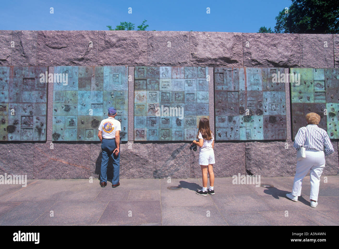 Tourists visiting the Washington DC Franklin Delano Roosevelt Memorial USA social distancing Stock Photo