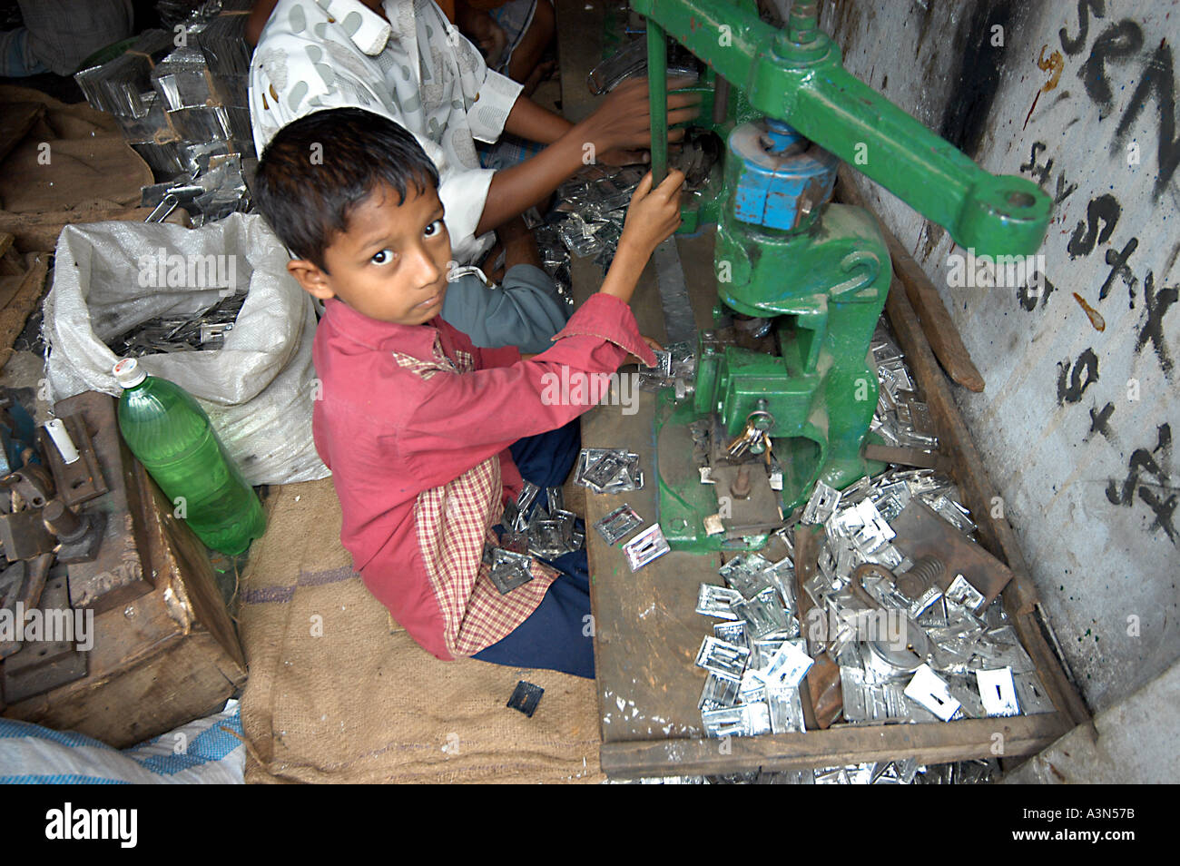 Children work in factories in Dhaka, Banghladesh. They are often run