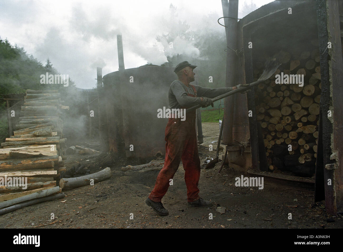Charcoal burner working on the production of charcoal in the Bieszczady