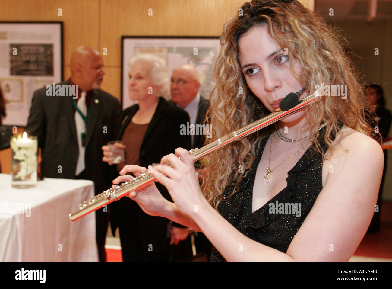Miami Florida,Overtown,historic Lyric Theater,theatre,reception,Hispanic woman female women,flutist,flute,musician,playing,music,FL060130629 Stock Photo