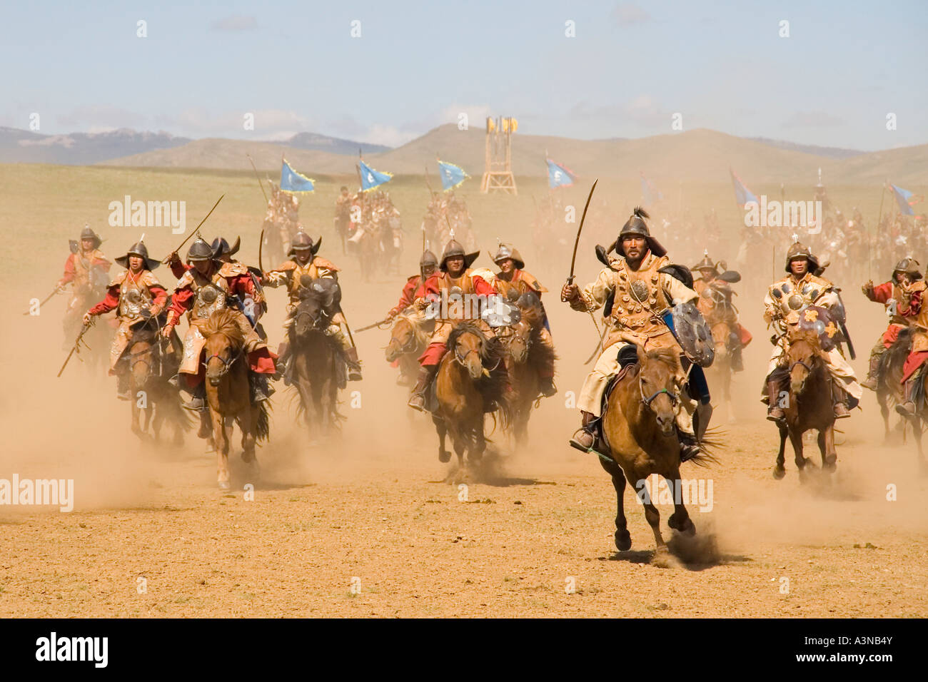 Fierce Mongolian warriors on horrseback charging into battle Stock Photo