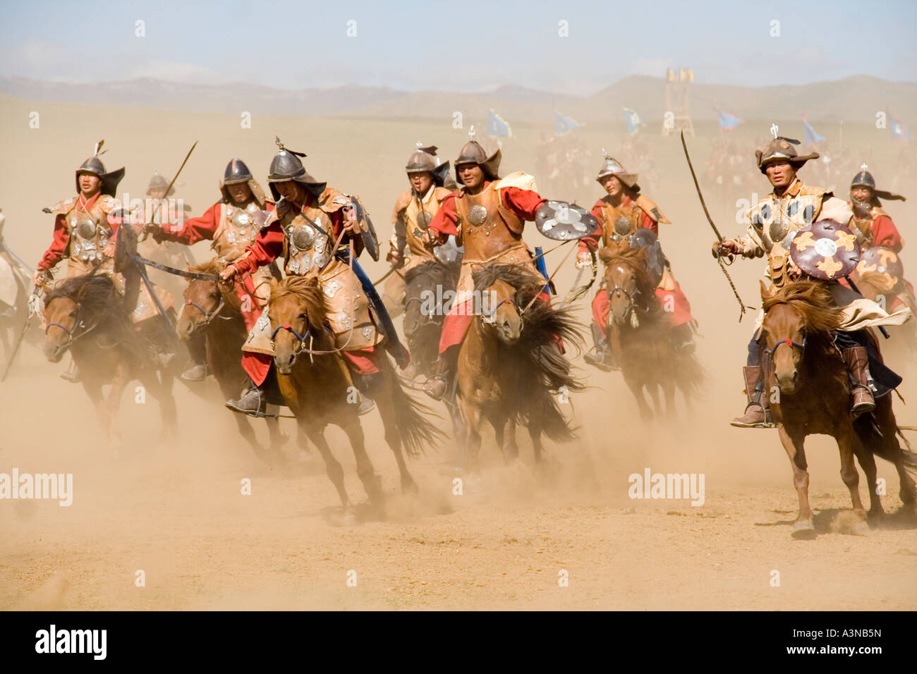 Gengis Khan's soldiers on horseback with spears drawn Stock Photo