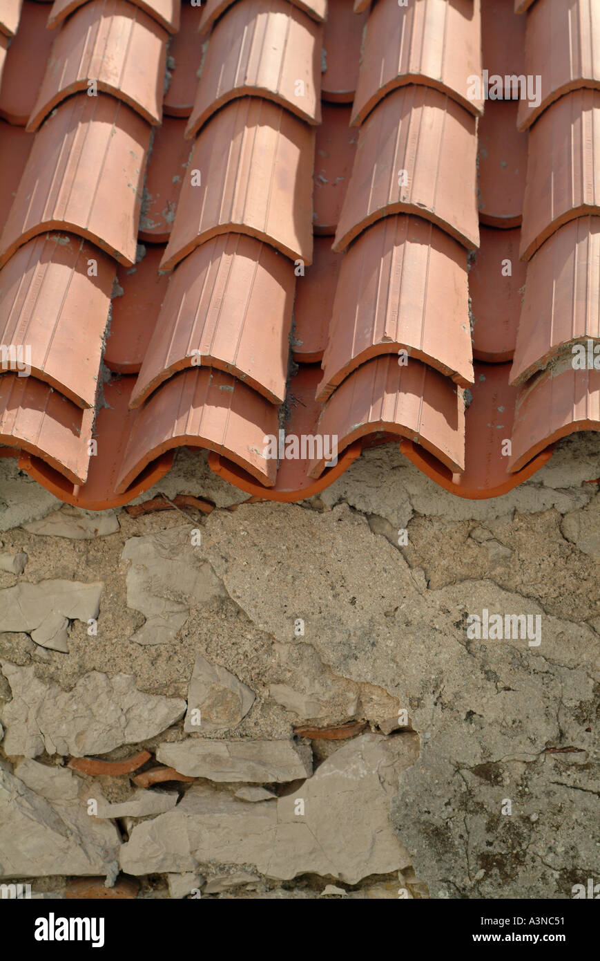 Red Roof Tiles and Old Wall on Building in Tribunj Croatia Stock Photo