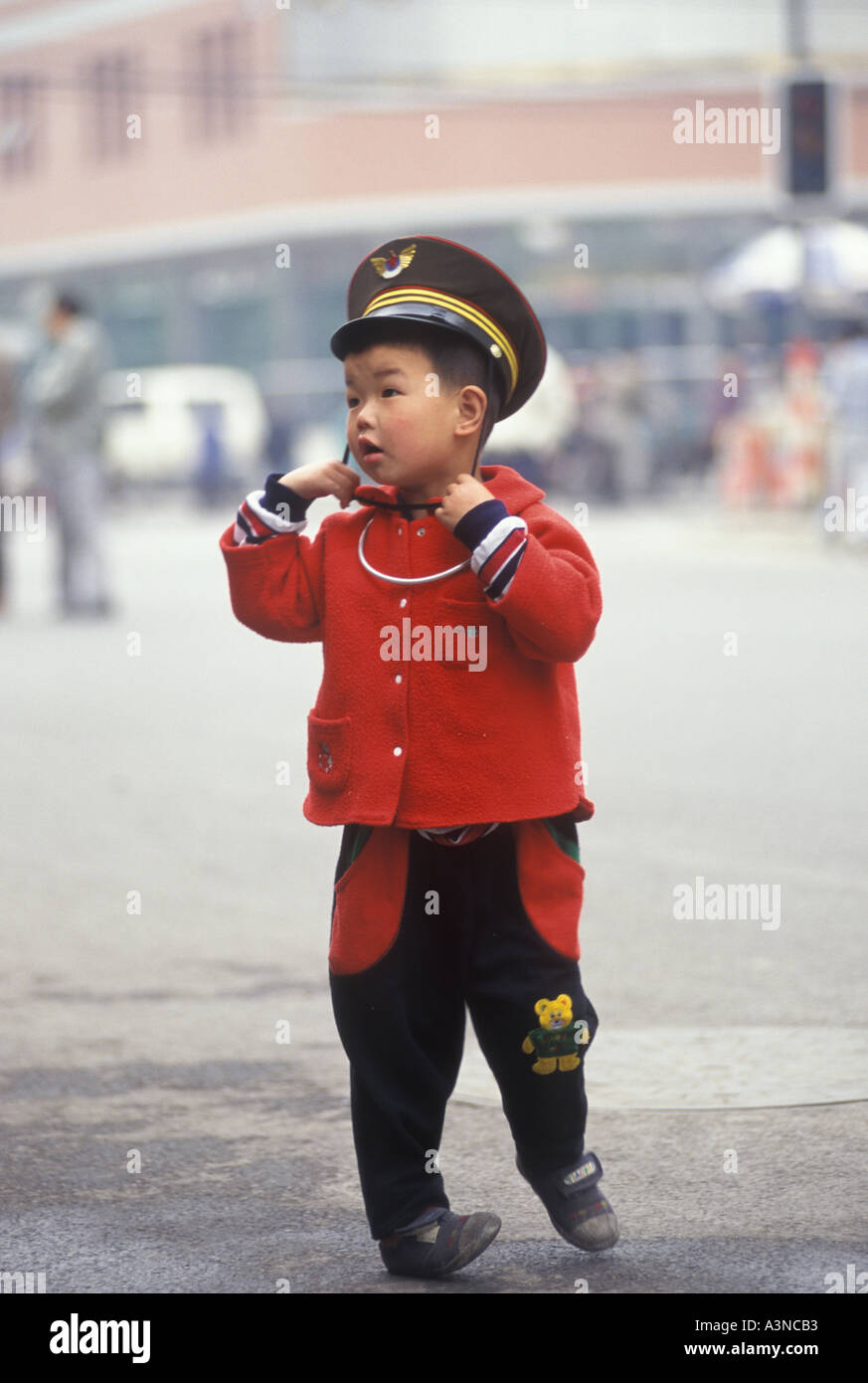 Beijing 1990s China small boy dressed as soldier by parents 1998, they were called the Little Emperors. HOMER SYKES Stock Photo