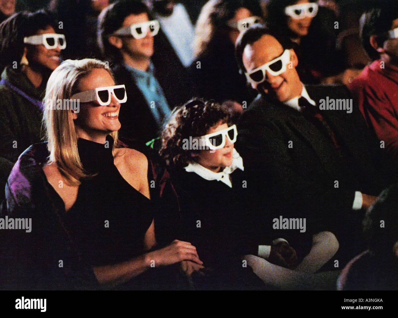 CURLEY SUE  James Belushi and Kelly Lynch with Alsan Porter centre in the 1991 Columbia film Stock Photo