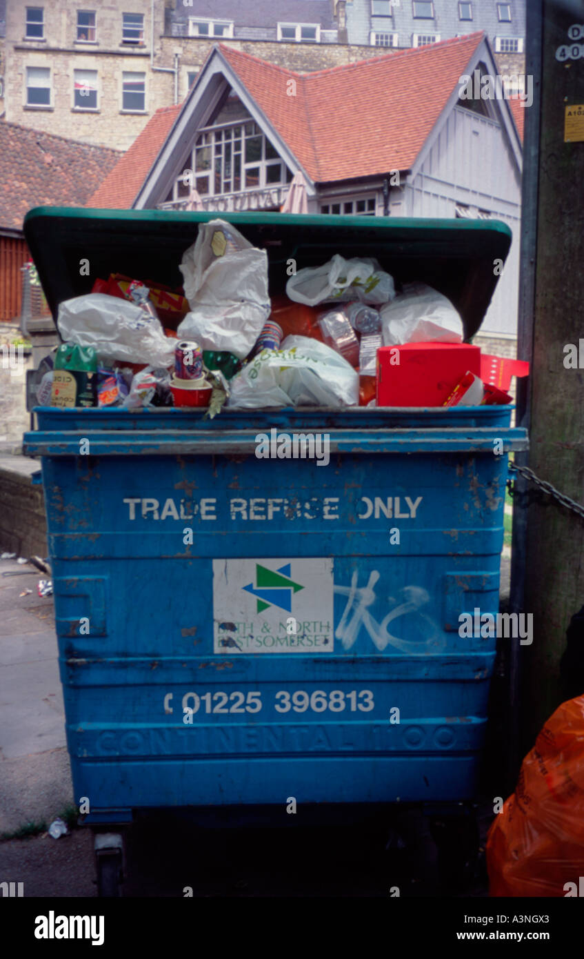 Rubbish and waste overflowing from large trade refuse only wheelie bin