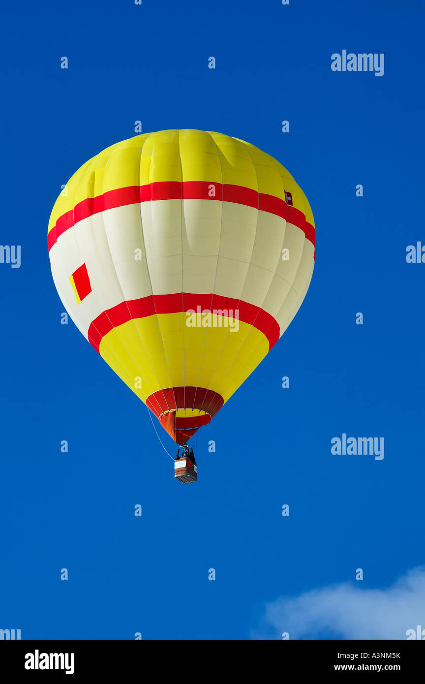 Hot air balloon yellow in sky hi-res stock photography and images - Alamy